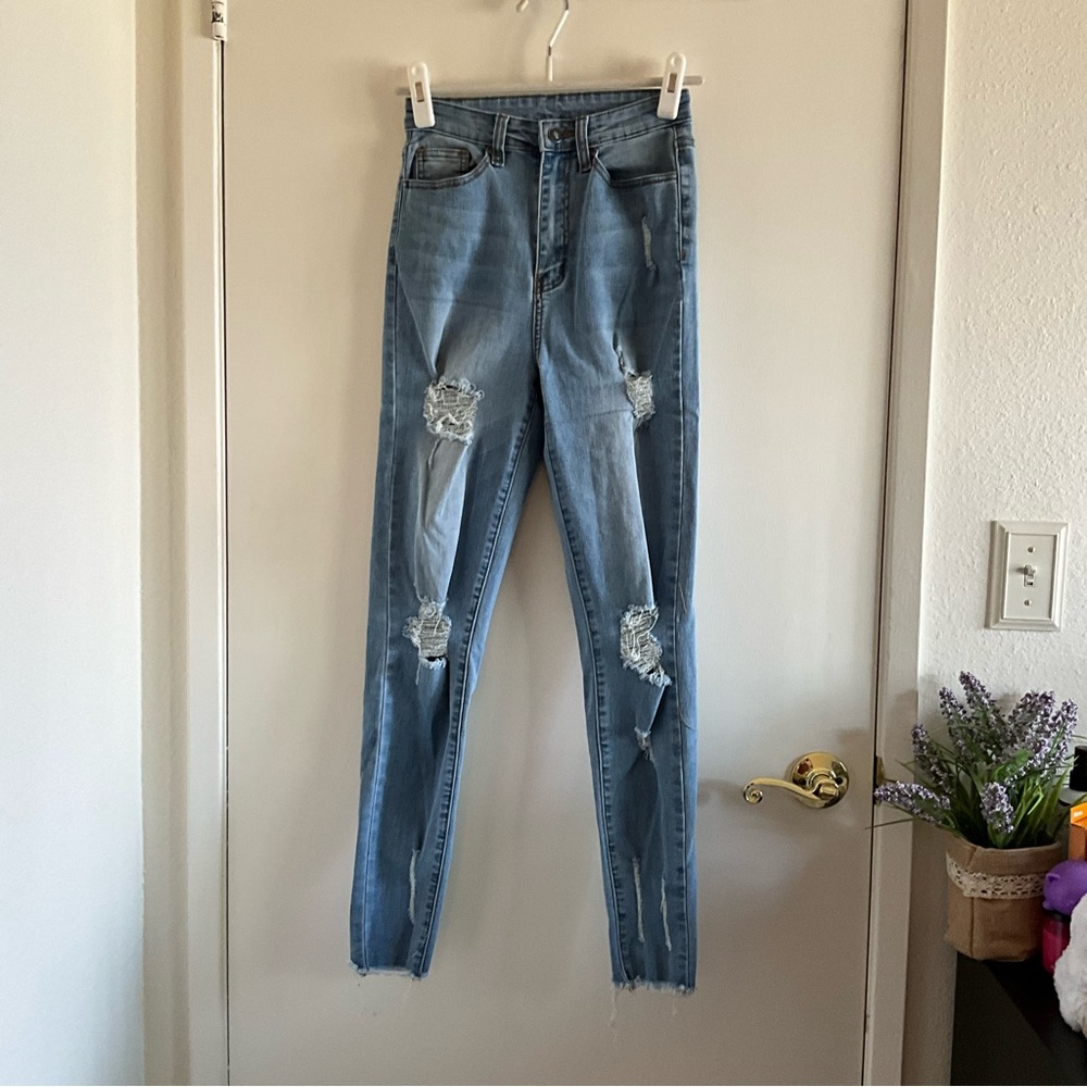 Ripped denim skinny high rise jeans